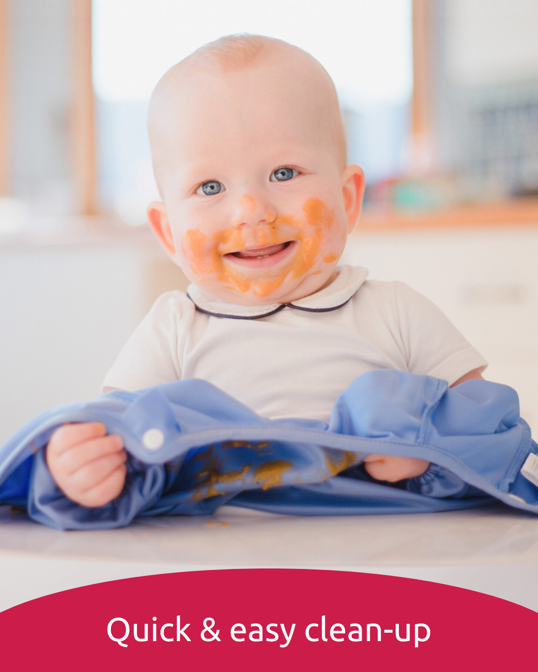 Baby smock bib pulled down to reveal clean white tshirt.